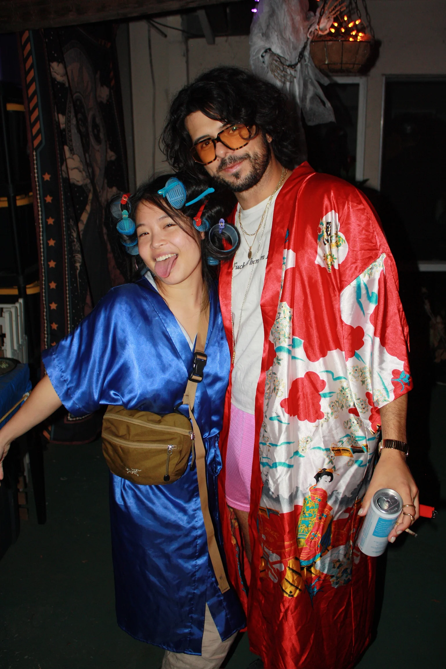 Two friends in colorful Halloween costumes